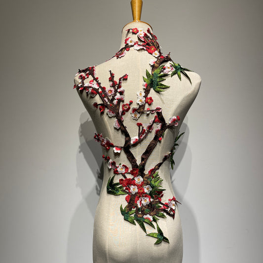 Plum blossom embroidery appliqué with delicate stitching