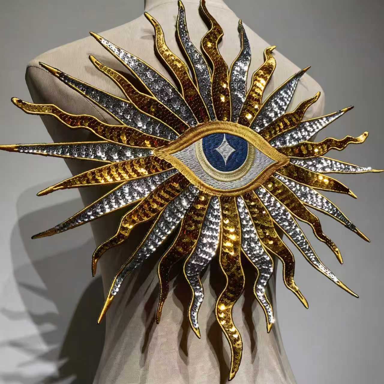 Close-up details of gold and silver metallic threads and luxury sequins on oversized mystic evil eye jacket patch patchmanstore
