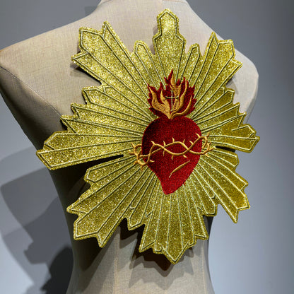 Alternate angle showing intense shimmering gold sequins on grand sunburst sacred heart embroidered back patch patchmanstore