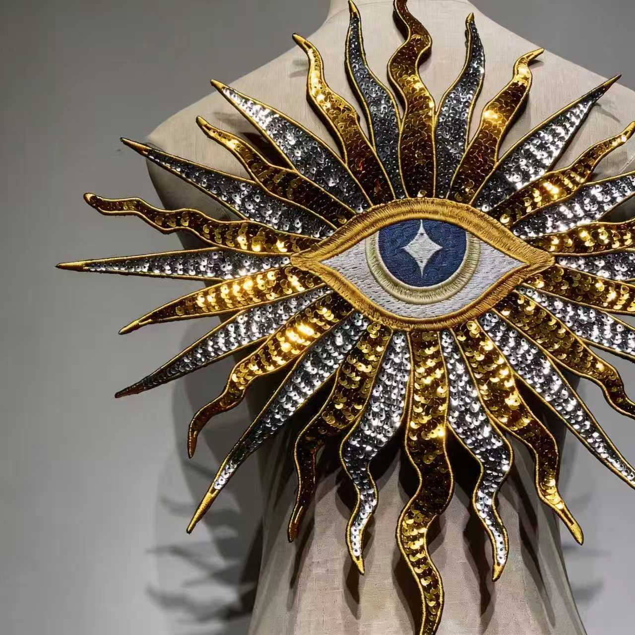 Alternate close-up angle of gold and silver metallic sequins on oversized 39cm sunburst mystic evil eye patch back patchmanstore